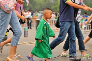 kid wearing Guoan jersey