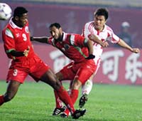 Yu Genwei scoring the winner against Oman