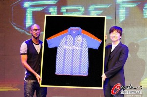 Straight down to business: Anelka on his first public appearance in Shanghai