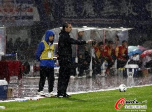 Sergio Batista's first game in the torrential rain...