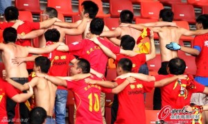 Chongqing FC fans celebrate by 'doing the Poznan'