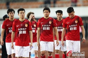 Evergrande players after their 1-3 home loss to Changchun