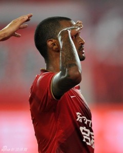 Rene Junior salutes the South End fans after scoring a rare goal at their end; all 13 other goals at Tianhe this season have been scored in the north goal.