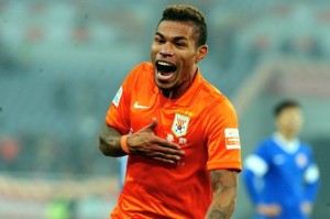 Urso celebrates scoring a goal n his debut for Shandong back in 2014