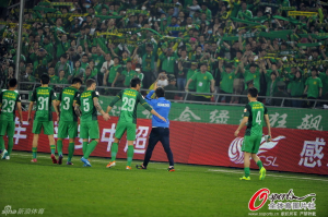 Ex-Beijing player Wang Xiaolong gets a bit confused about who his current employers are at the final whistle