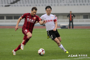 Tobias Hysen rounds Sun Jihai to tuck away his third goal.