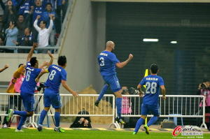 Masterstroke: Makeshift striker Eleilson (3) celebrates scoring Jiangsu's second