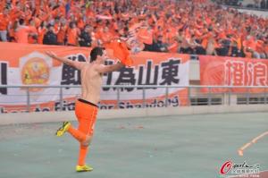 New Henan signing Ryan McGowan celebrates scoring the winning goal in the 2014 CFA Cup final