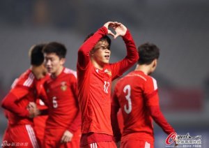 Showing Heart: Xie Pengfei celebrates his goal against Australia