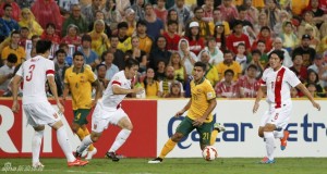 Ren Hang (centre) chase the ball as Mei Fang looks on