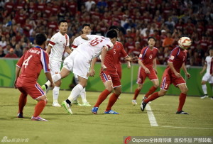 Shining Sun: Sun Ke heads in his third goal of the tournament against North Korea 