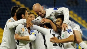 Making Progress: Uzbek players celebrate a goal on their way to the 2011 Asian Cup semi-final