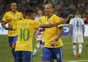 Pedigree: Diego Tardelli celebrates one of two goals against Argentina in Beijing