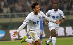 Moving On: Du Zhenyu celebrates his hat-trick against Harbin Yiteng