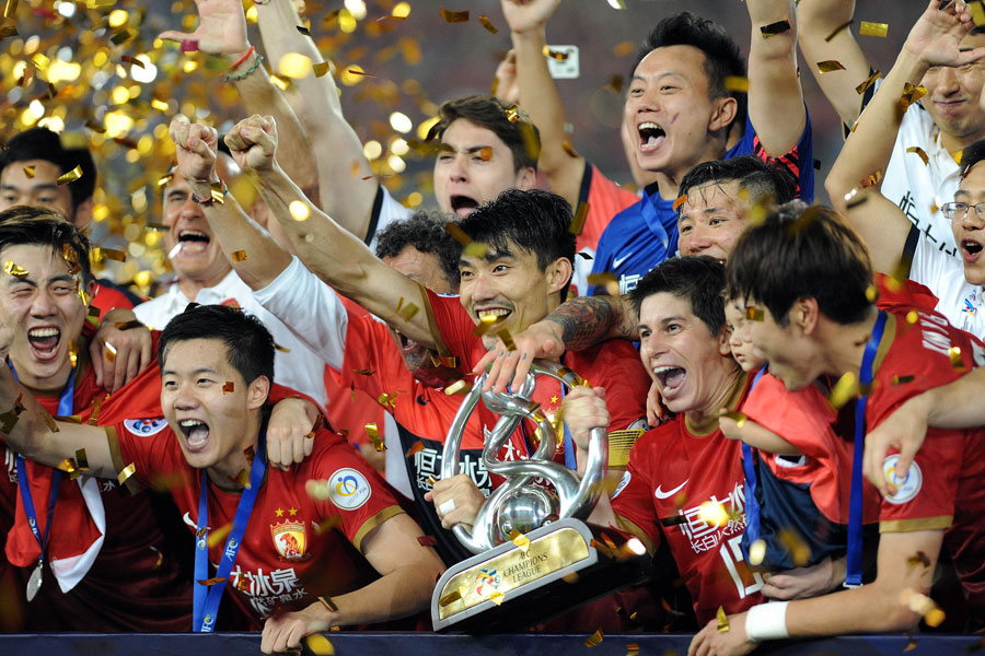 Evergrande's squad celebrates continental success in 2013