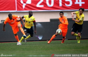 Resilient: Former Guizhou Renhe centre back Jonas Salley (30) marshals a defence which has conceded just one goal in three away games