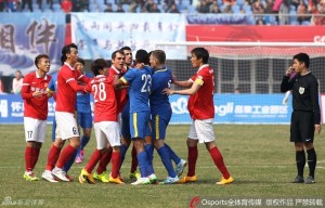 No, Min Was Better: Goal Scorers Nenad Milias (facing camera) and Ricardo Steer (23) tussle during the game