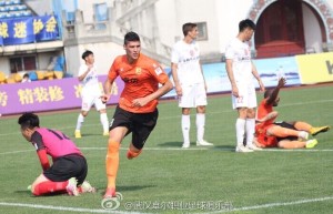 Rafa Jorda wheels away after scoring his first goal for Wuhan