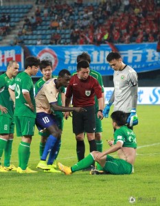 Shenzhen's Babacar Gueye (10) shows the signs of a frustrating season