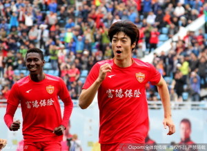 Ha Tae-goon, flanked by Steve, celebrates one of his treble