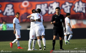 One Each: Goal scorers Ismael Beko Fofana and Zhu Jianrong embrace