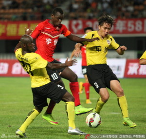 Captain's Crunch: Zhongyou and Shenzhen's fiery captains Jonas Salley (30) and Babacar Gueye (10) fight for the ball