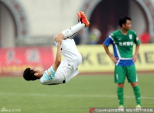 On A High: Liu Shangkun celebrates his late winner with a spot of levitation