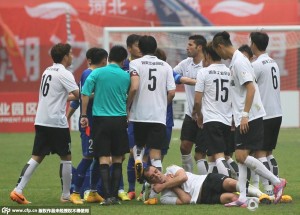 Chen Tao's elbow to Nenad Milijas (on the ground) was so painful the Serbian tried to knock himself out through self-strangulation