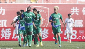 Guizhou Zhicheng players celebrate during a season of ups and downs