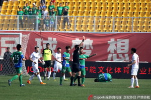 Dreamland: Zhicheng's hardcore travelling supporters look on as Li Zhuangfei is shown a red card