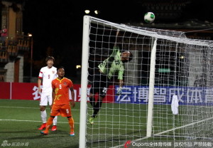 National Hero: Bhutan's Hari Gureng makes one of many saves to keep the scoreline down