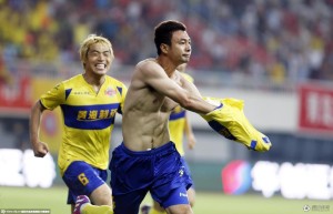 Hainiu goal scorer Wang Xuanhong proves he hasn't been sitting around drinking the local beer during his absence