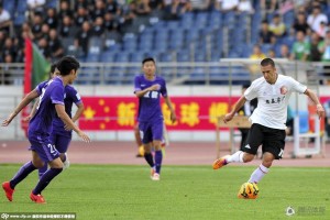 Xinjiang's Cristian Danalache in CFA Cup action against Tianjin TEDA. Xinjiang and Beijing BG are the only two League One clubs in the CFA Cup's last eight