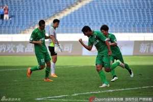 Rafael celebrates his first goal for XInjiang with League One top scorer Cristian Danalache (10)