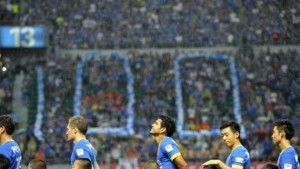 Harbin fans celebrate Ricardo Steel's (centre) 100th appearance for the club but he was unable to provide them with a goal