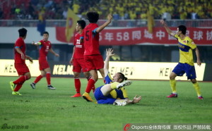 Dorde Rakic is brought down for the penalty which allowed him to equalise