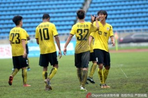 Hohhot players celebrate Dori's (10) late winner