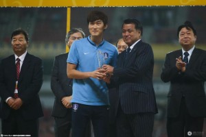 South Korea's Jang Hyun-soo collects the player of the tournament award