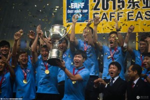 South Korean players celebrate the end of the protracted East Asian Cup awards ceremony