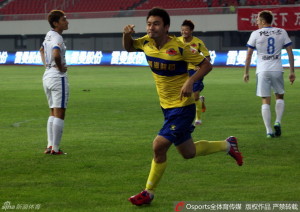 Hainiu's Wang Xuanhong celebrates a winning goal against Harbin Yiteng. Hainiu have beaten some good teams this year and won't be pushovers