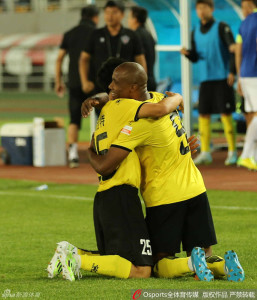 William Paulista and Deng Hanwen celebrate the former's equaliser, but Hohhot still went on to lose