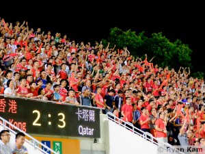 The crowd urge Hong Kong forward one more time by Ryan Kam