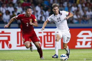 Mr Lonely: Hong Kong striker Jaimes McKee (22) cut an isolated figure when Hong Kong faced China in Shenzhen