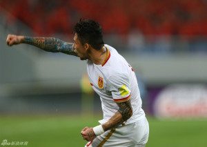 Zhang Linpeng celebrates putting China 3-0 up