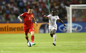 Godfred Karikari in action for Hong Kong against China