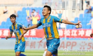 Zhang Shuo celebrates his winning goal for Songjiang