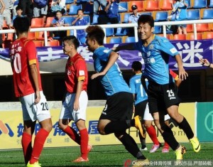 Transcendence's Han Jiabao (9) celebrates his goal against Nanjing