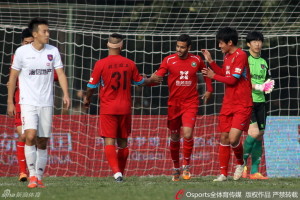 Maureen Franco (31) congratulates Andres Marquez on scoring his ninth penalty of the season