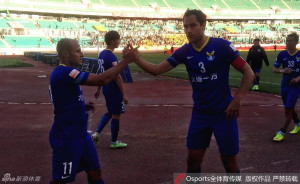 Dalian players Nicklas Backman (3) and Bruno Meneghel (11) will need a minor miracle this weekend if they are to get back to the Super League