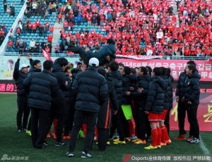 Yanbian manager Park Tae-ha is given the bumps not long before he announced he would be with the club next year